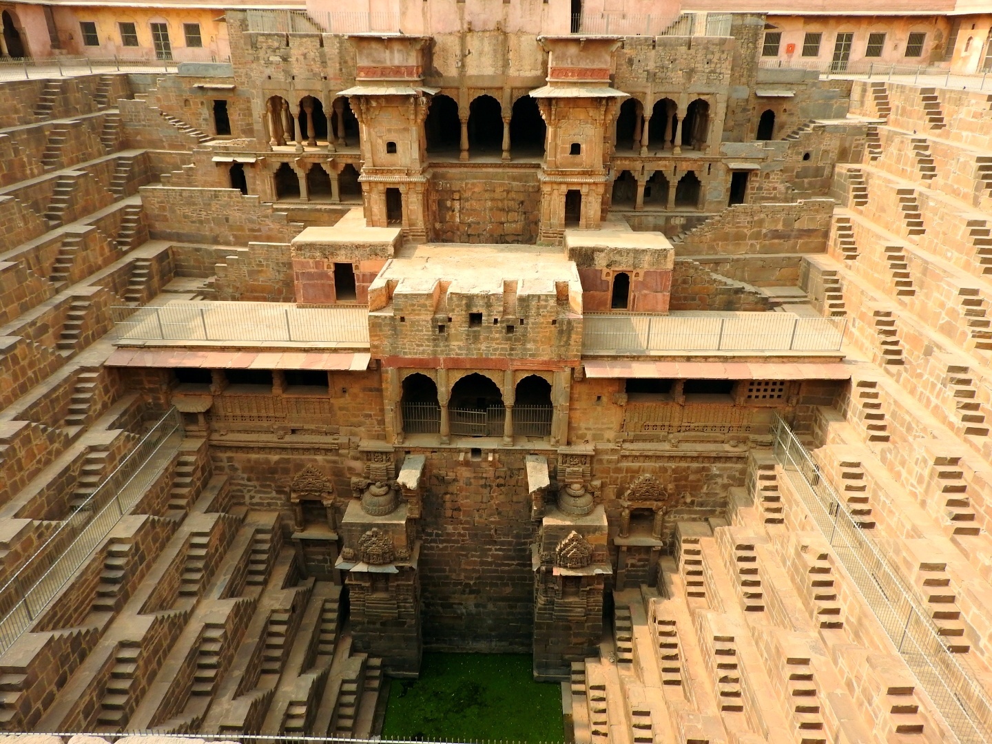 Abhaneri Stepwell Fatehpur Sikri tour from Jaipur featuring Chand Baori and Mughal architectural heritage landmarks.