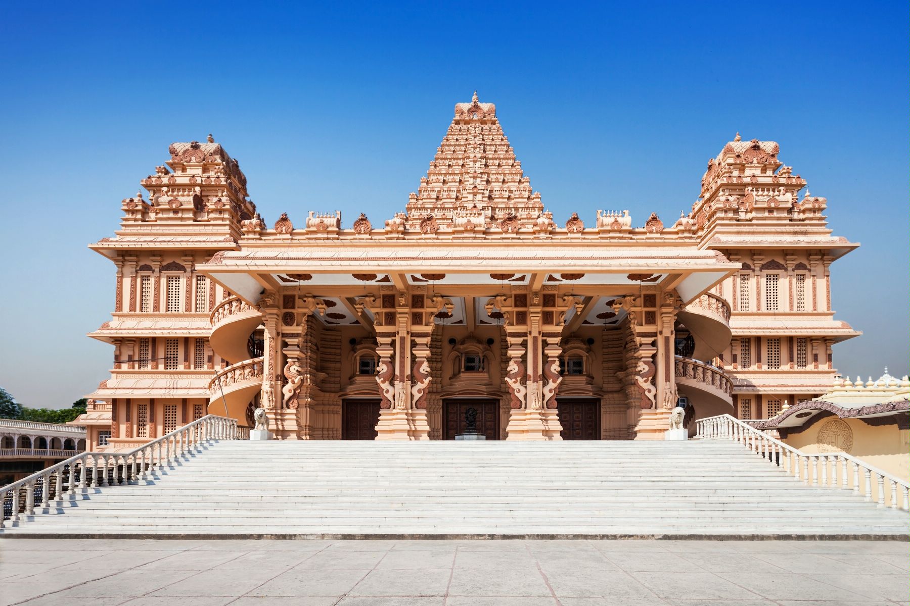 Explore one of Delhi's largest temple complexes with stunning marble structures, lush gardens, and sacred religious significance.