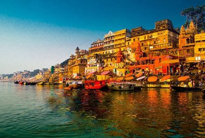Boats along the sacred Ganges River at Varanasi Ghats during sunset