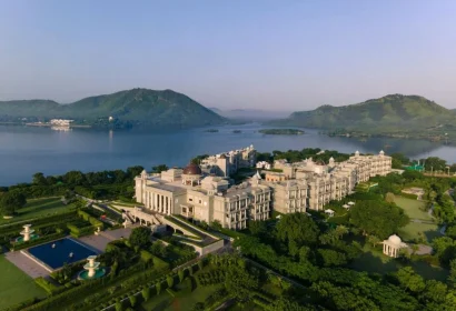 Luxury view of The Oberoi Udaivilas overlooking Lake Pichola and Aravalli Hills
