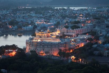 City palace Udaipur aerial night view Lake Pichola rajasthan India